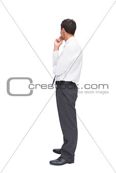 Thoughtful classy businessman looking away