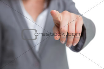 Hand pointing at screen