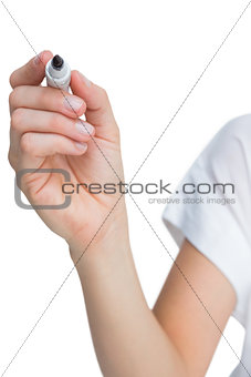 Female hand holding whiteboard marker
