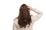 Rear view of classy businesswoman scratching her head