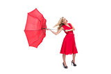 Attractive glamour woman holding a broken umbrella