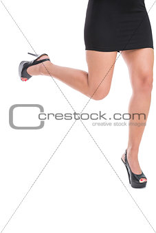 Close up on woman lifting up her leg
