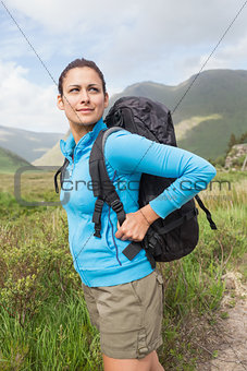 Female hiker looking away