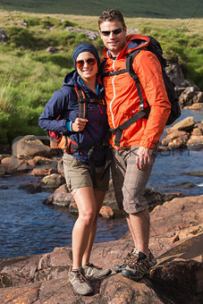 Smiling couple on a hike