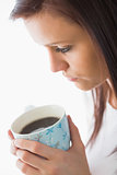 Peaceful girl holding a cup of coffee