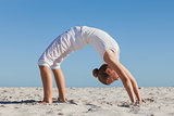 Woman doing crab yoga pose