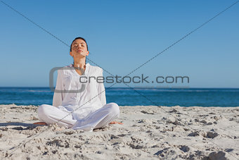 Peaceful woman sitting and relaxing