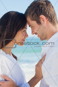Romantic couple relaxing on the beach