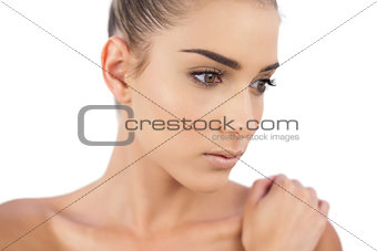 Close up of a stern woman looking away