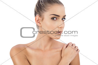 Close up of a thinking woman looking at camera