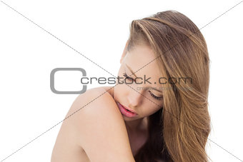 Calm brunette model posing looking her shoulder