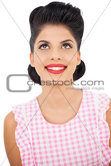 Smiling black hair model looking up
