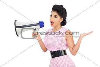Seductive black hair model using a megaphone