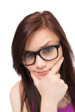 Close up on thinking brunette with glasses