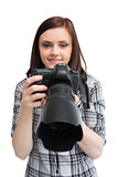 Smiling young casual photographer posing