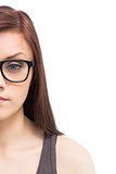 Half face of young woman wearing glasses posing