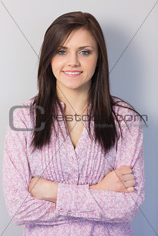 Smiling classy brunette posing