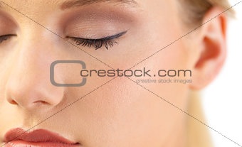 Close up on gorgeous blondes closed eye