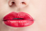 Extreme close up on gorgeous red lips