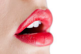Extreme close up on open gorgeous red lips