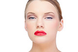 Bare blonde model wearing red lips