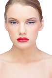 Nude blonde model wearing red lips