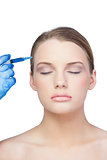 Relaxed young model having botox injection