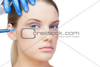 Attractive young model having botox injection