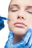 Relaxed pretty model having botox injection above the lips