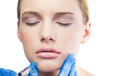 Peaceful pretty model having botox injection on the lips