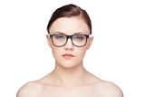 Pensive natural model wearing classy glasses