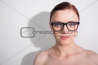 Relaxed clean model with classy glasses posing
