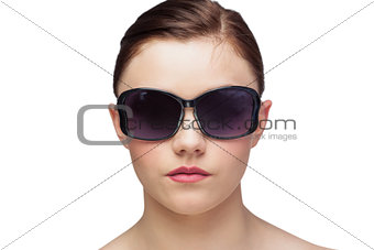 Young model wearing classy sunglasses