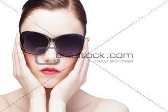 Glamorous young model wearing stylish sunglasses