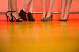 Womens legs wearing high heels
