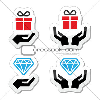 Hands with present and diamond icons set