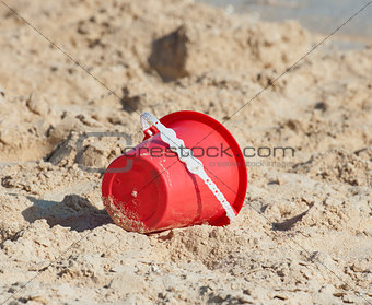 Childs bucket on a tropical beach