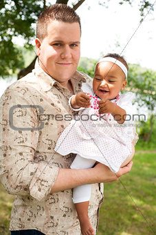 Caucasian father and his african girl