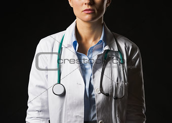 Closeup on doctor woman isolated on black
