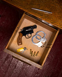 Desk Drawer Full of Self Defense Items and Gun