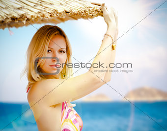 young pretty woman on a beach