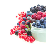 Ripe  of fresh berries on white