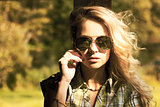 Portrait of Blonde Woman with Sunglasses