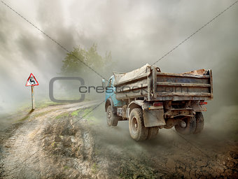 Dirty truck on a country road
