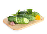 Ripe sliced cucumber on cutting board