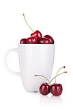 Ripe cherries in a cup