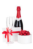 Champagne bottle, glasses and gift