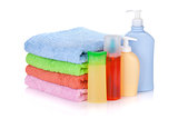 Cosmetics bottles and towels