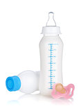 Baby yoghurt, milk bottle and pacifier