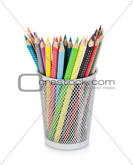 Various colour pencils in holder